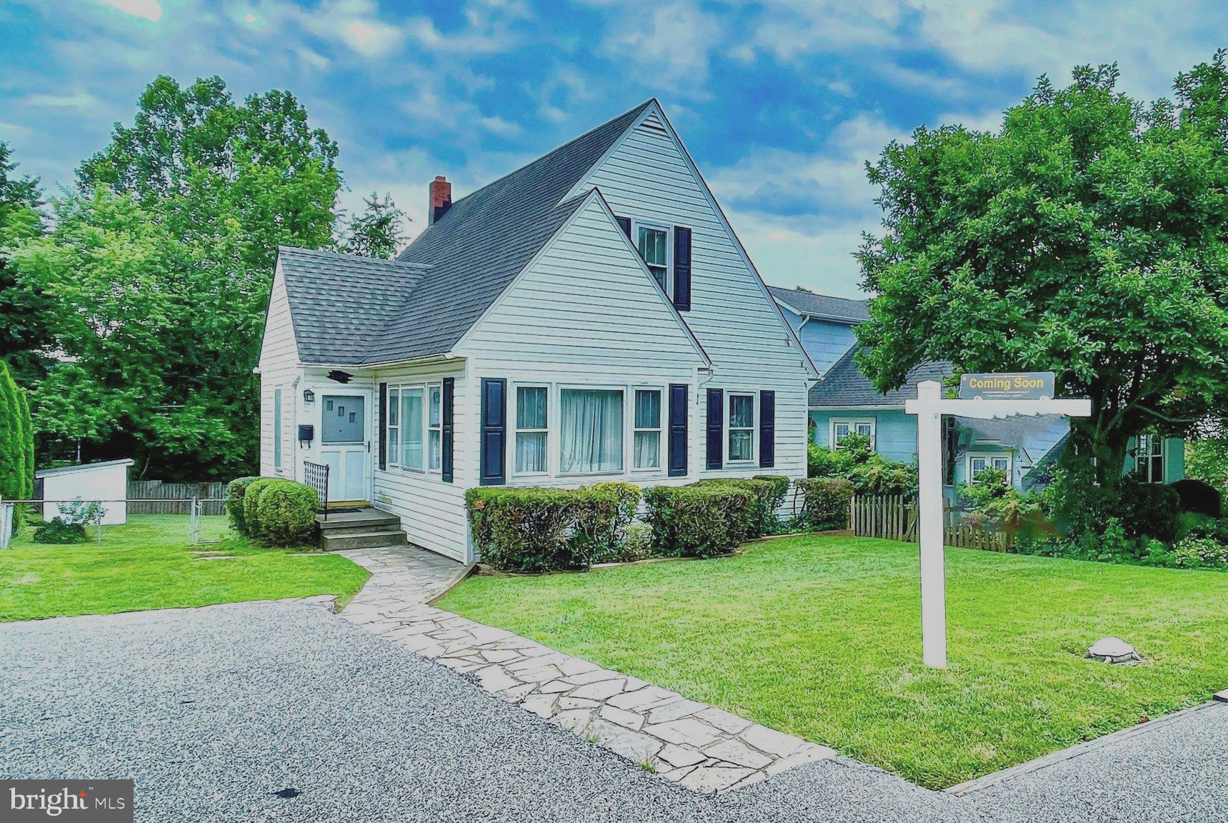 6505 Beechwood Road Baltimore, MD 21239 - Photo 46 of 46 a front view of a house with a yard