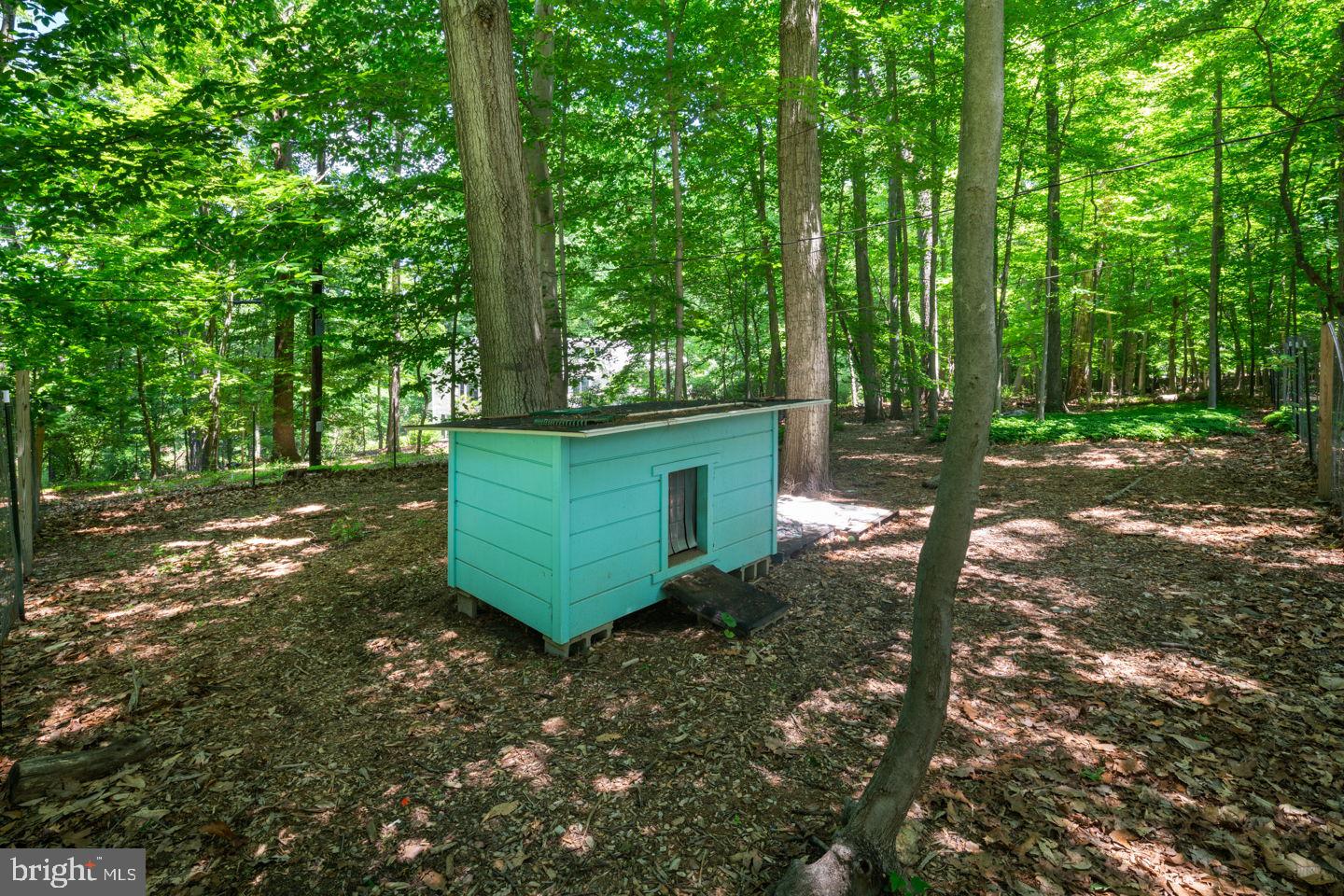 23 Northwoods Road Wayne, PA 19087 - Photo 29 of 33 Fenced-in dog run with heated dog house.