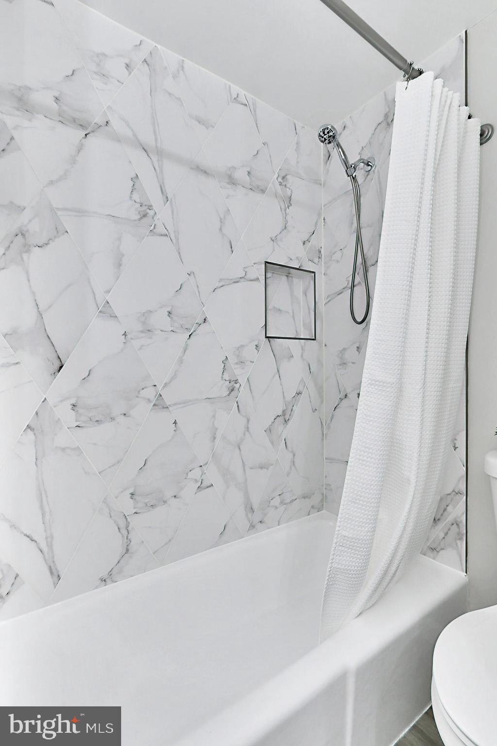 6401 Limerick Court Springfield, VA 22152 - Photo 25 of 50 Hall bath tub and shower surround