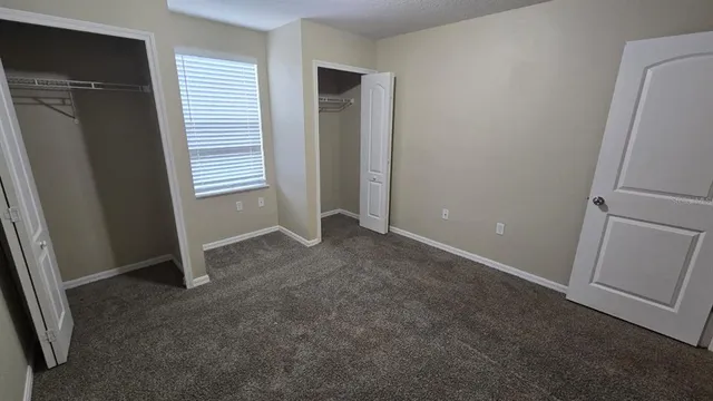 an empty room with closet