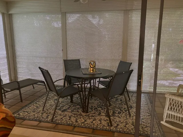 a view of a outdoor seating area with furniture