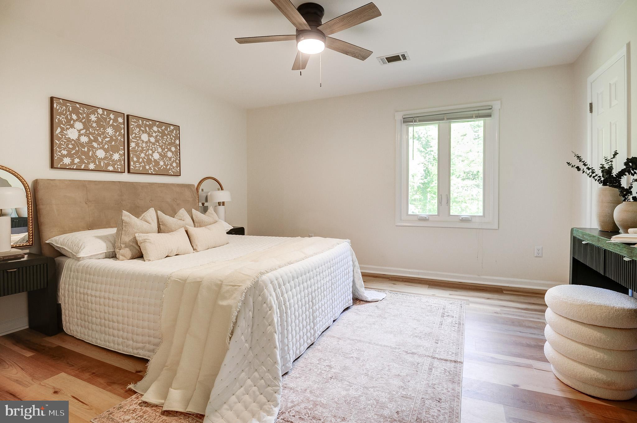 10116 Evans Ford Road Manassas, VA 20111 - Photo 27 of 63 a bedroom with a bed and a window