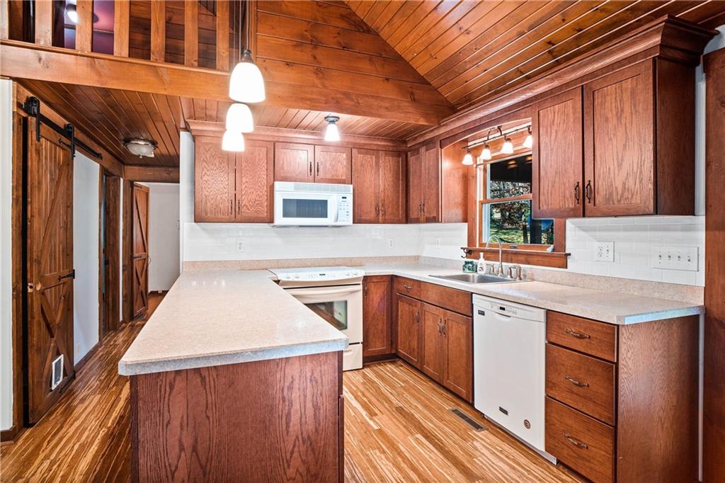 79 Willadell Road Transfer, PA 16154 - Photo 14 of 25 a kitchen with a sink stove and cabinets