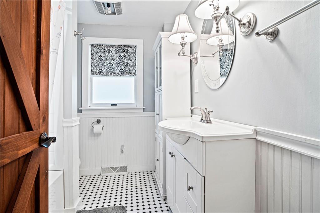 79 Willadell Road Transfer, PA 16154 - Photo 19 of 25 a bathroom with a sink a toilet and a mirror
