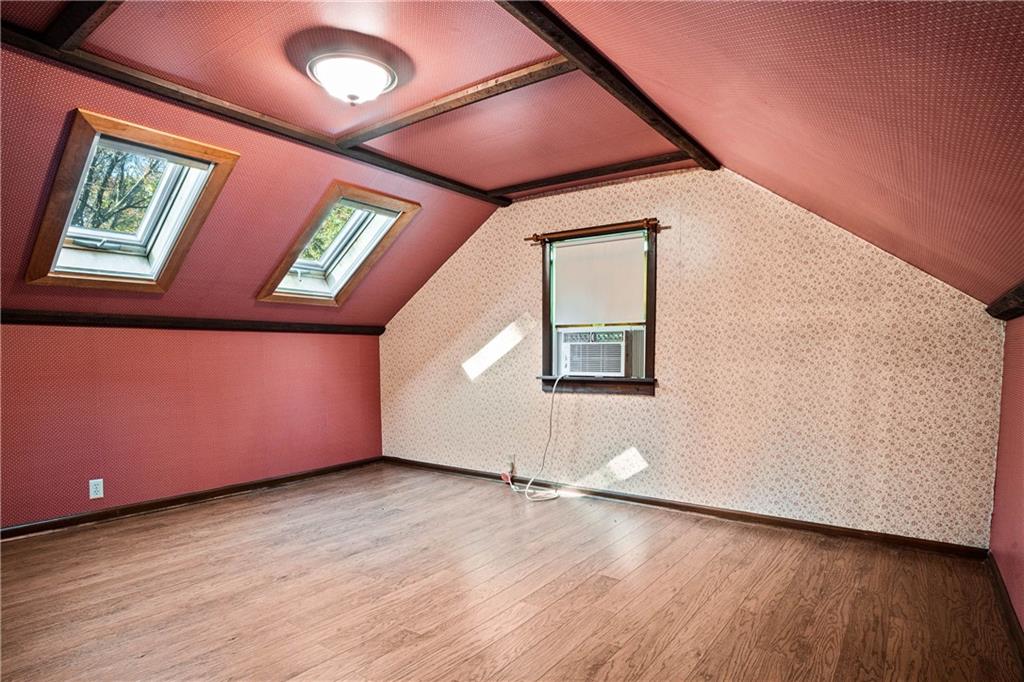 79 Willadell Road Transfer, PA 16154 - Photo 23 of 25 an empty room with wooden floor and windows