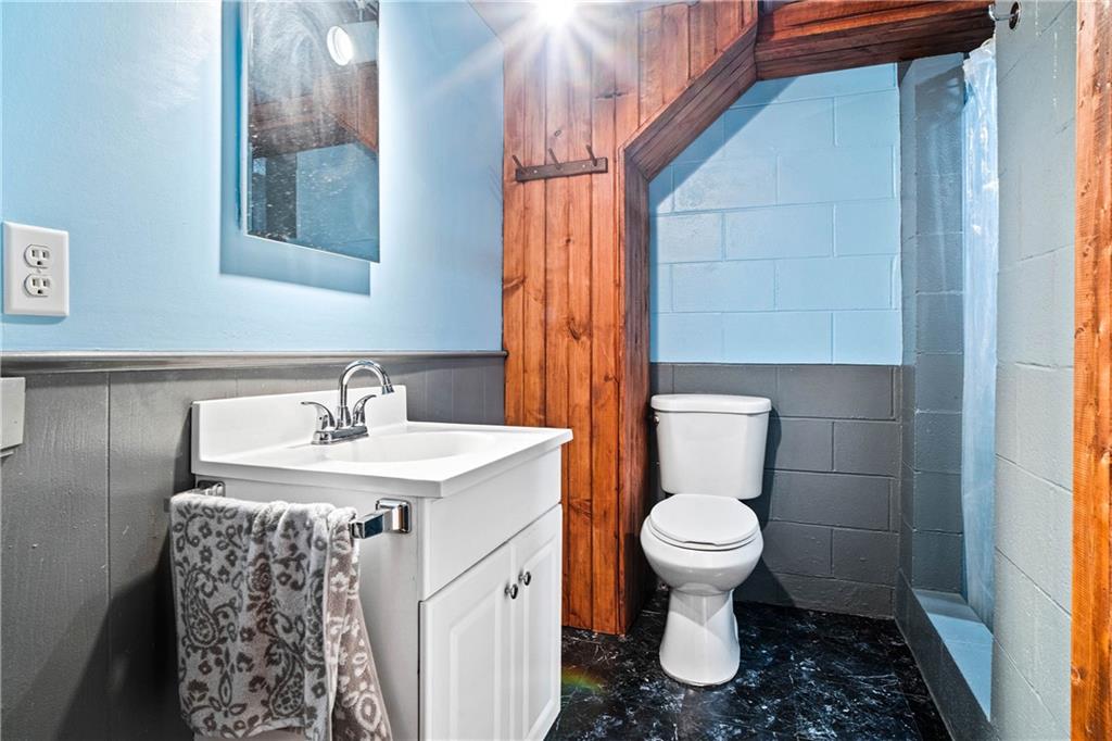 79 Willadell Road Transfer, PA 16154 - Photo 25 of 25 a bathroom with a sink toilet and a mirror