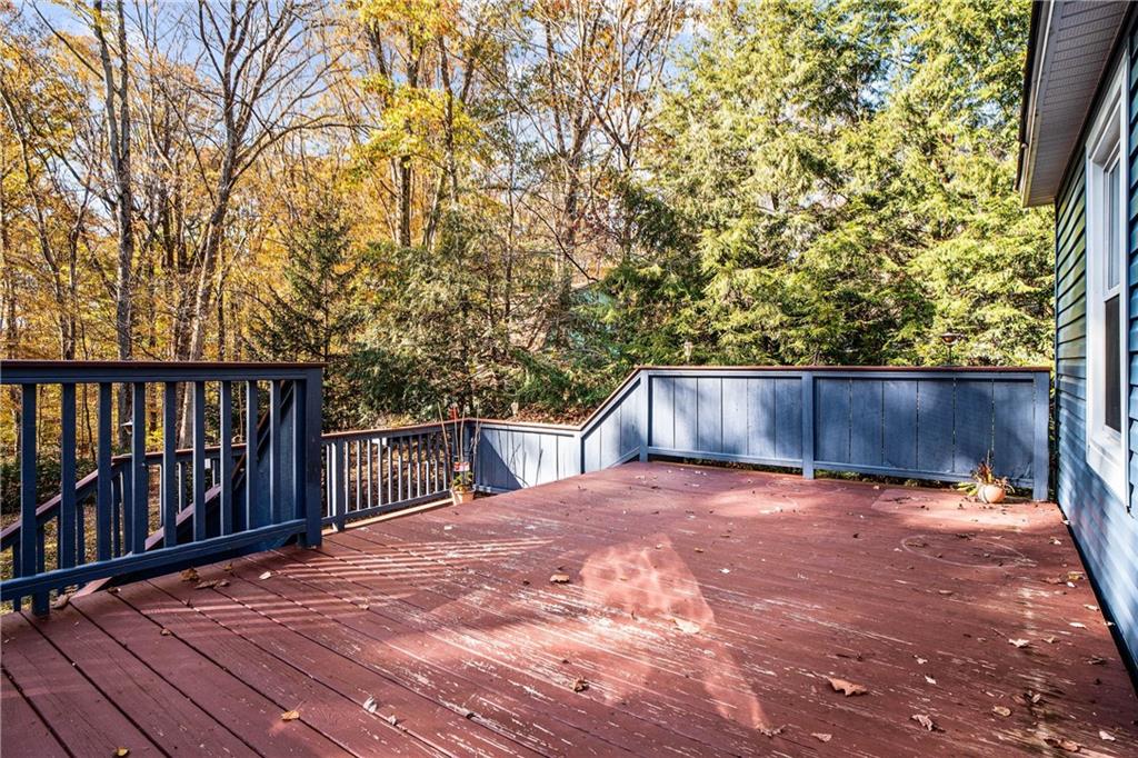 79 Willadell Road Transfer, PA 16154 - Photo 4 of 25 a view of backyard with wooden floor and fence