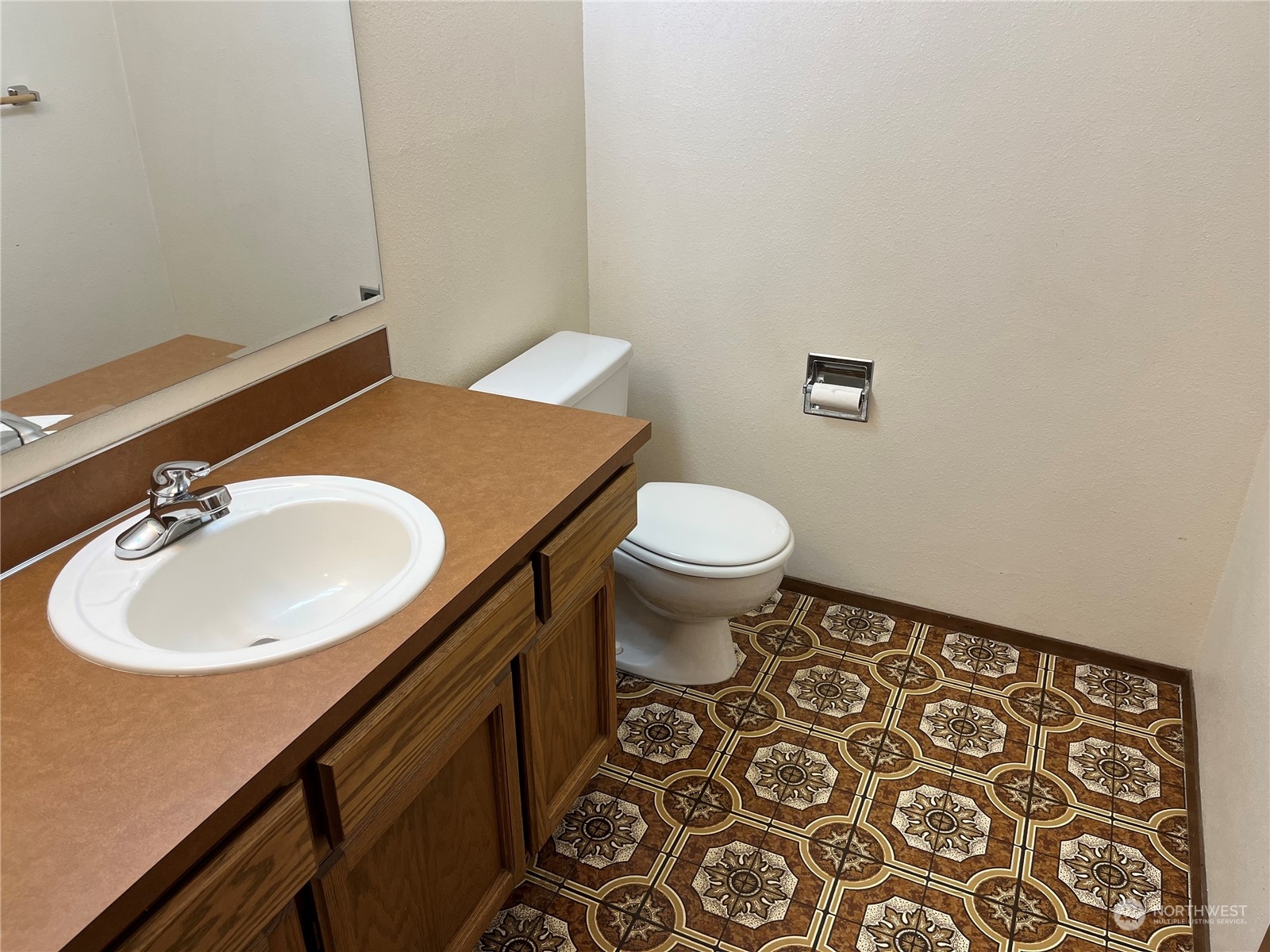 14005 149th Place Southeast Renton, WA 98059 - Photo 15 of 35 a bathroom with a sink and a toilet