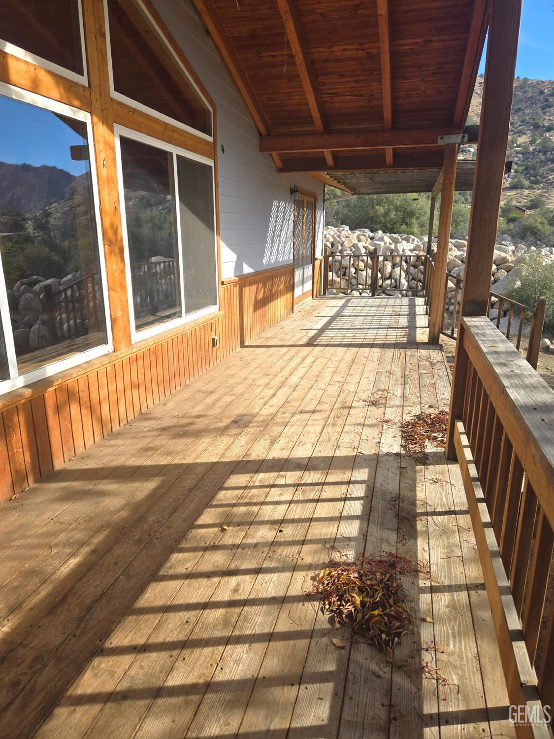 Undisclosed Address Weldon, CA 93283 - Photo 13 of 43 a balcony with wooden floor