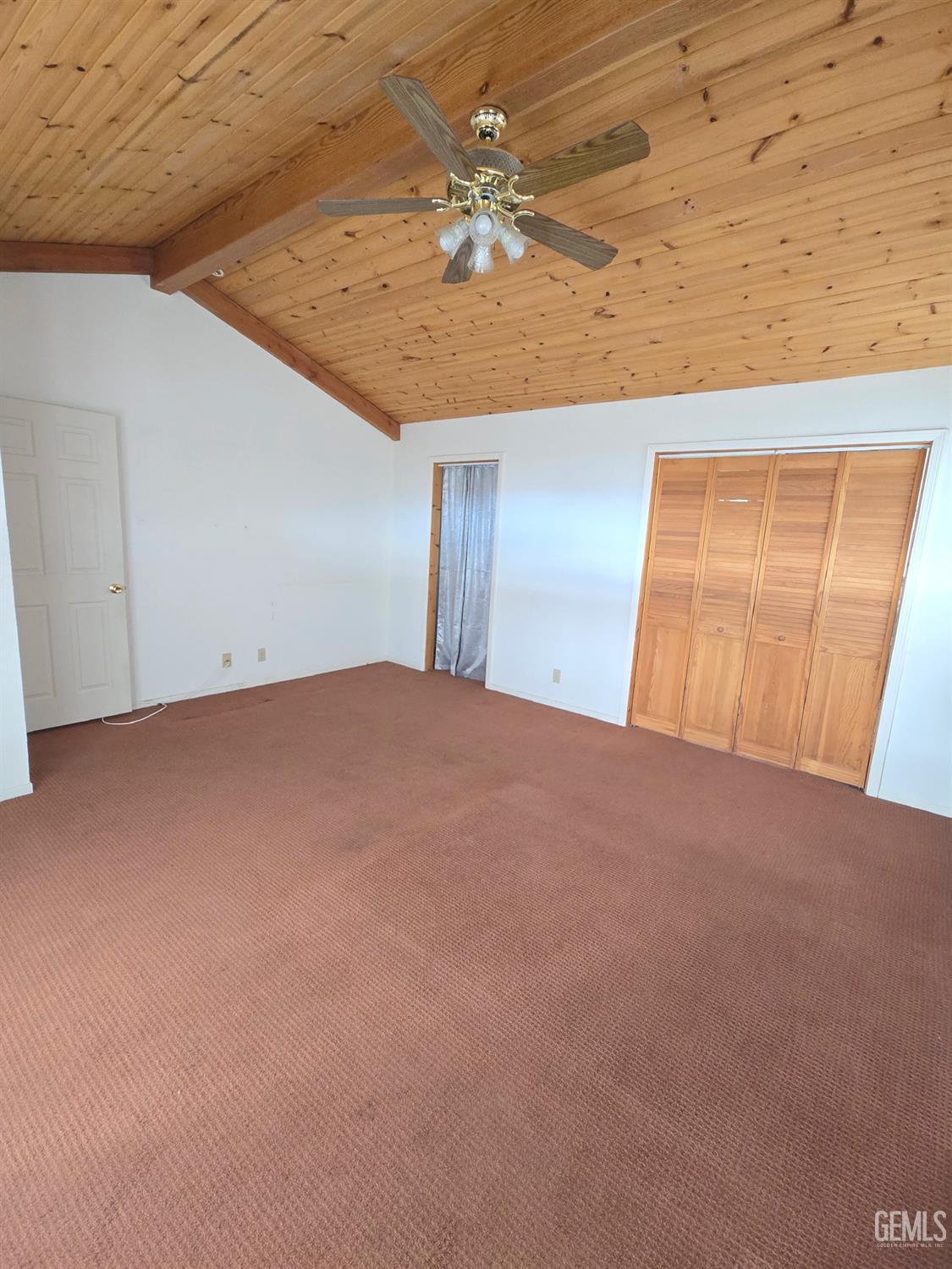 Undisclosed Address Weldon, CA 93283 - Photo 14 of 43 a view of a big room with closet and a chandelier fan