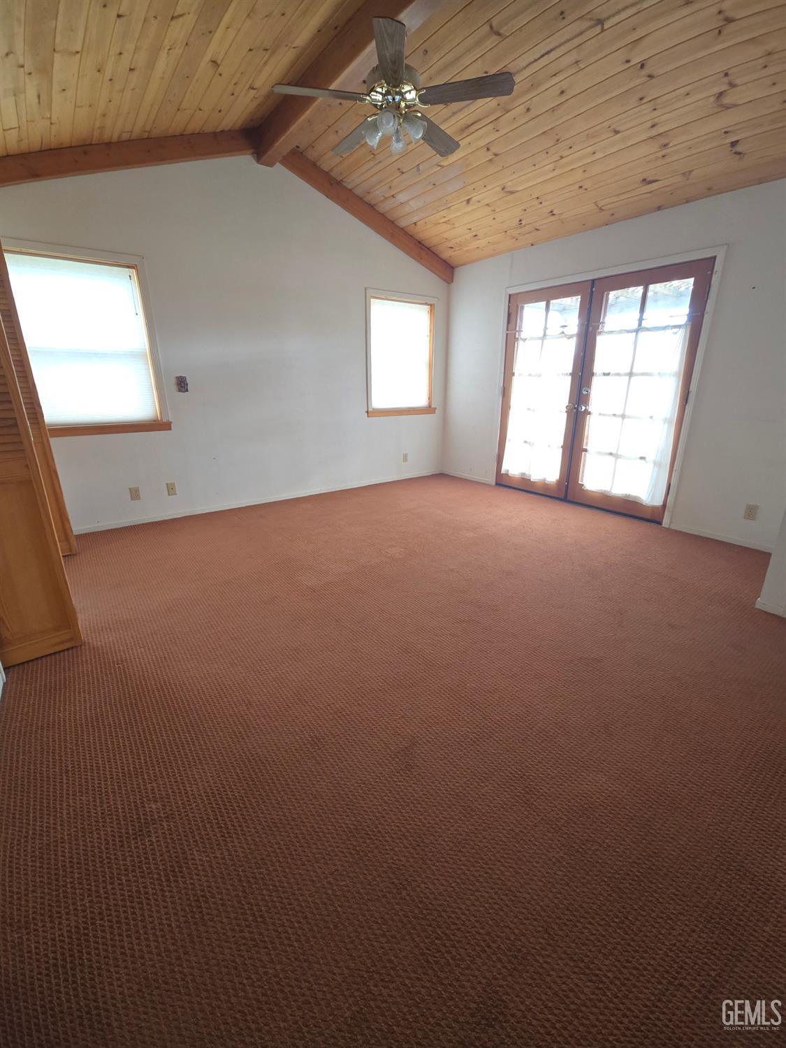 Undisclosed Address Weldon, CA 93283 - Photo 15 of 43 an empty room with windows and ceiling fan