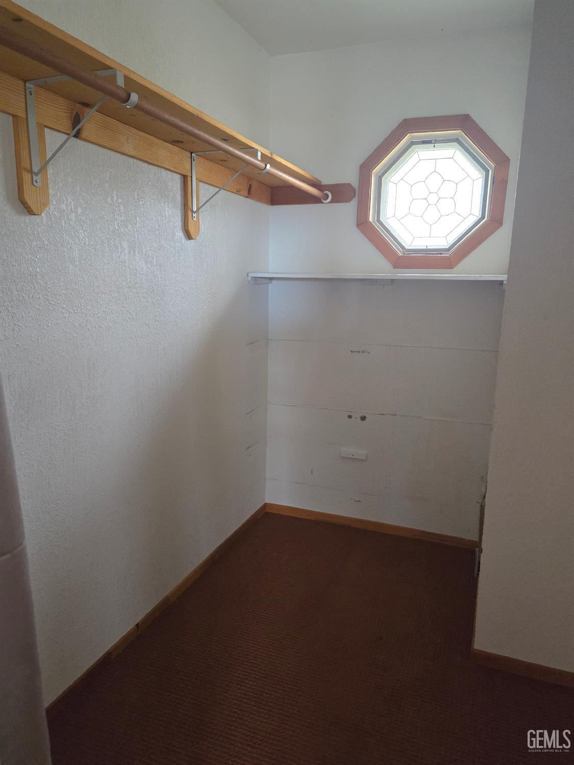 Undisclosed Address Weldon, CA 93283 - Photo 19 of 43 a view of a room with racks on the wall