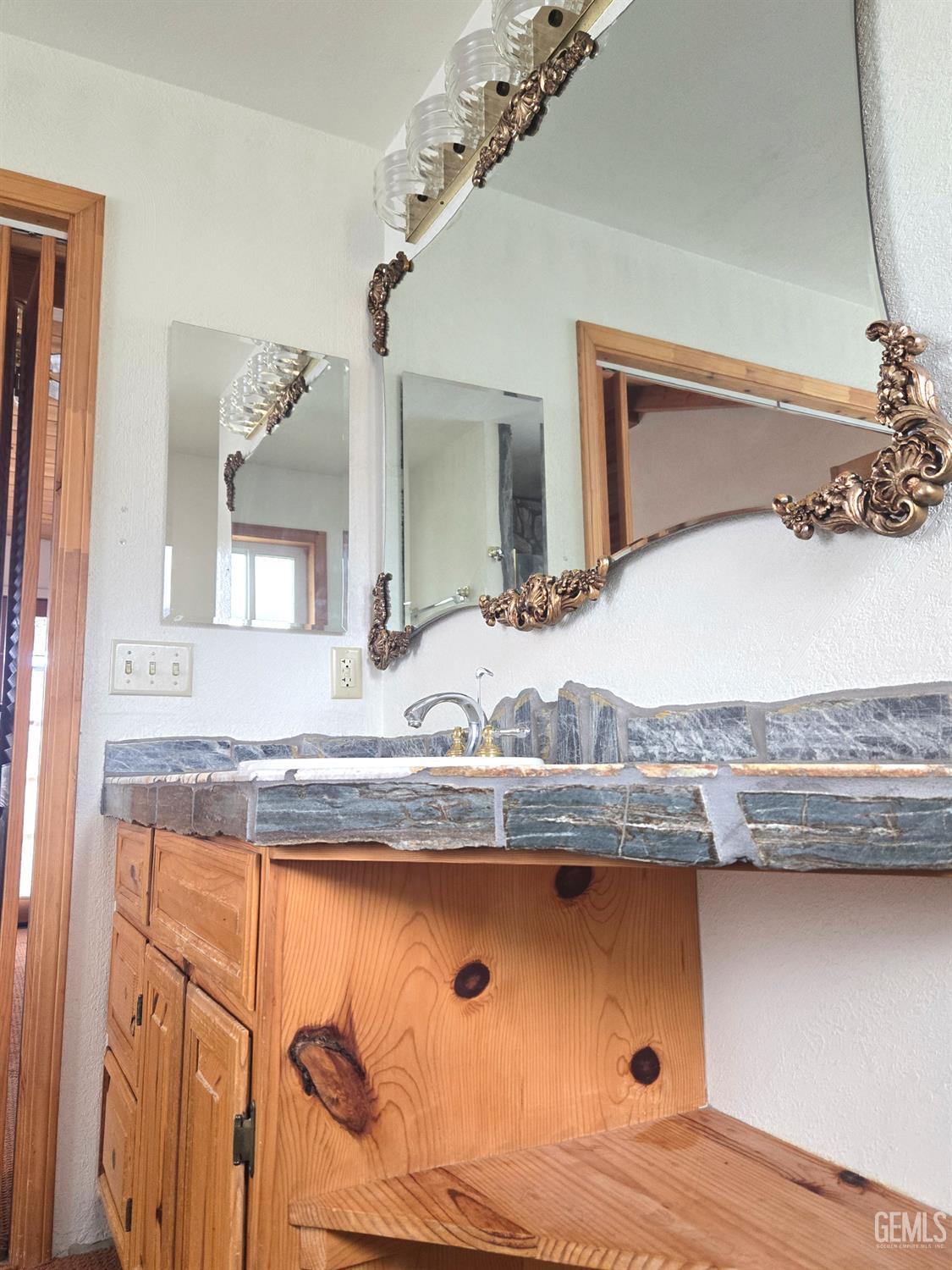 Undisclosed Address Weldon, CA 93283 - Photo 20 of 43 a bathroom with a granite countertop sink and a mirror