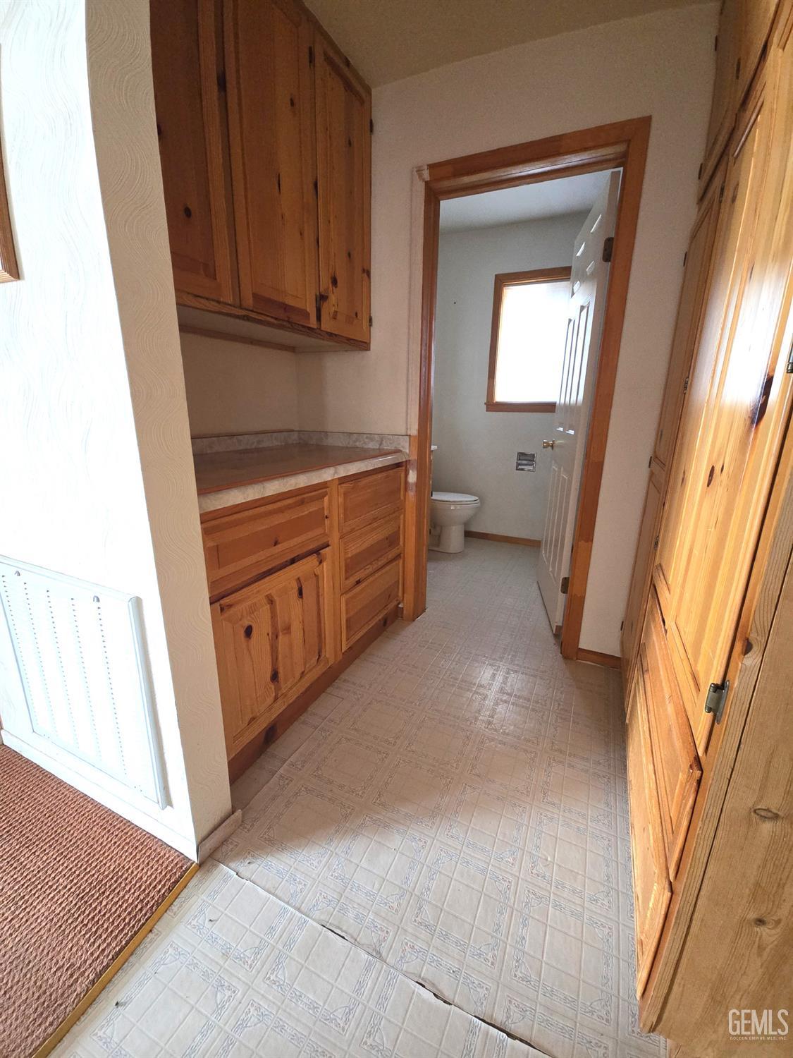 Undisclosed Address Weldon, CA 93283 - Photo 25 of 43 a room with window and cabinet