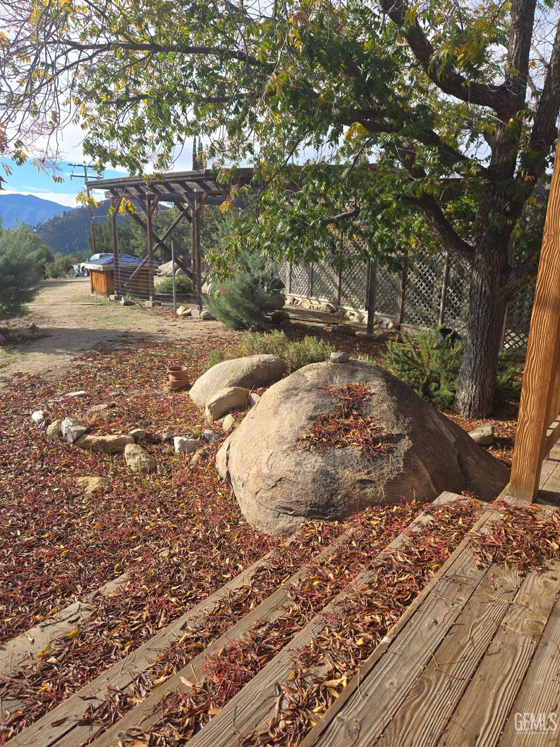 Undisclosed Address Weldon, CA 93283 - Photo 35 of 43 a view of a backyard of a house