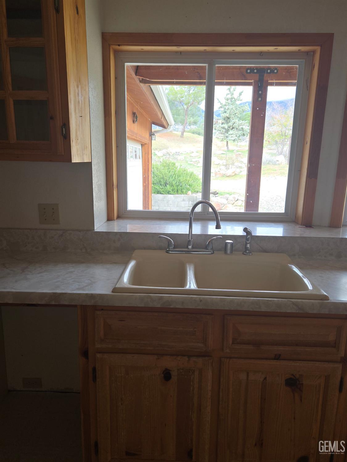 Undisclosed Address Weldon, CA 93283 - Photo 6 of 43 a view of a sink a window and a kitchen view