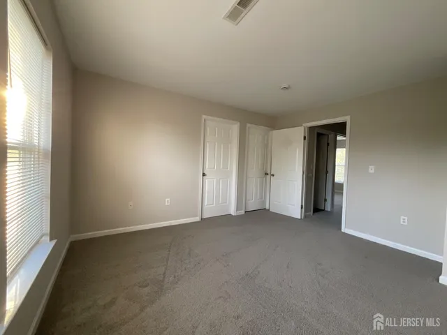 an empty room with window