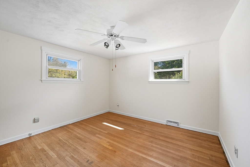 86 Talmadge Drive Springfield, MA 01118 - Photo 12 of 33 a view of empty room with wooden floor