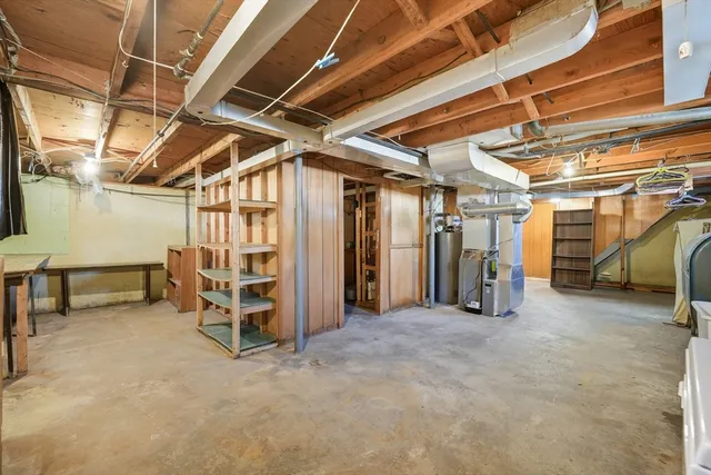 a view of an empty room with wooden roof