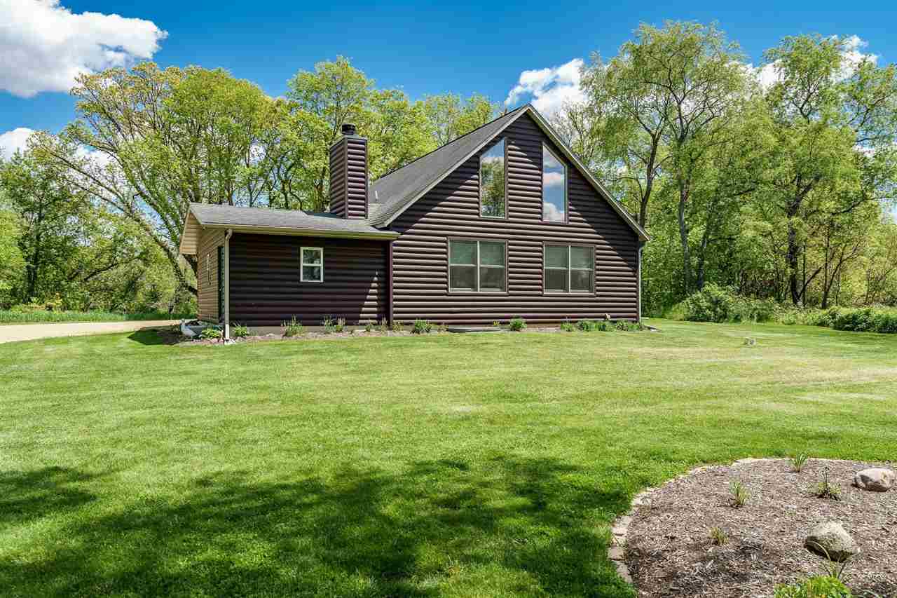 2353 South Watertown Road Oregon, IL 61061 - Photo 4 of 44 a front view of house with yard and green space
