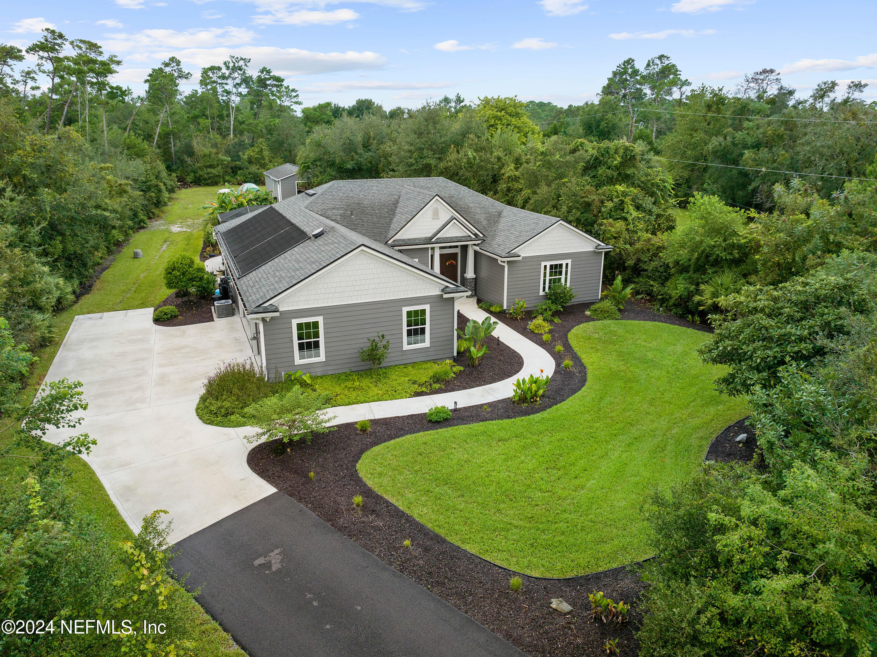 847 Oak Ridge Road St. Augustine, FL 32086 - Photo 4 of 36 an aerial view of a house