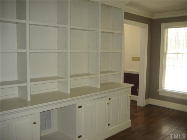 9619 Barton Creek Road Raleigh, NC 27615 - Photo 6 of 11 a room with a window and wooden floor