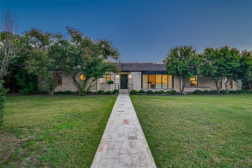 1319 El Patio Drive Dallas, TX 75218 - Photo 2 of 25 a view of house in front of a big yard with large trees