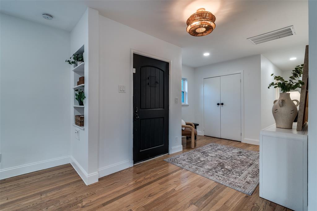 1319 El Patio Drive Dallas, TX 75218 - Photo 3 of 25 a view of livingroom with furniture and wooden floor