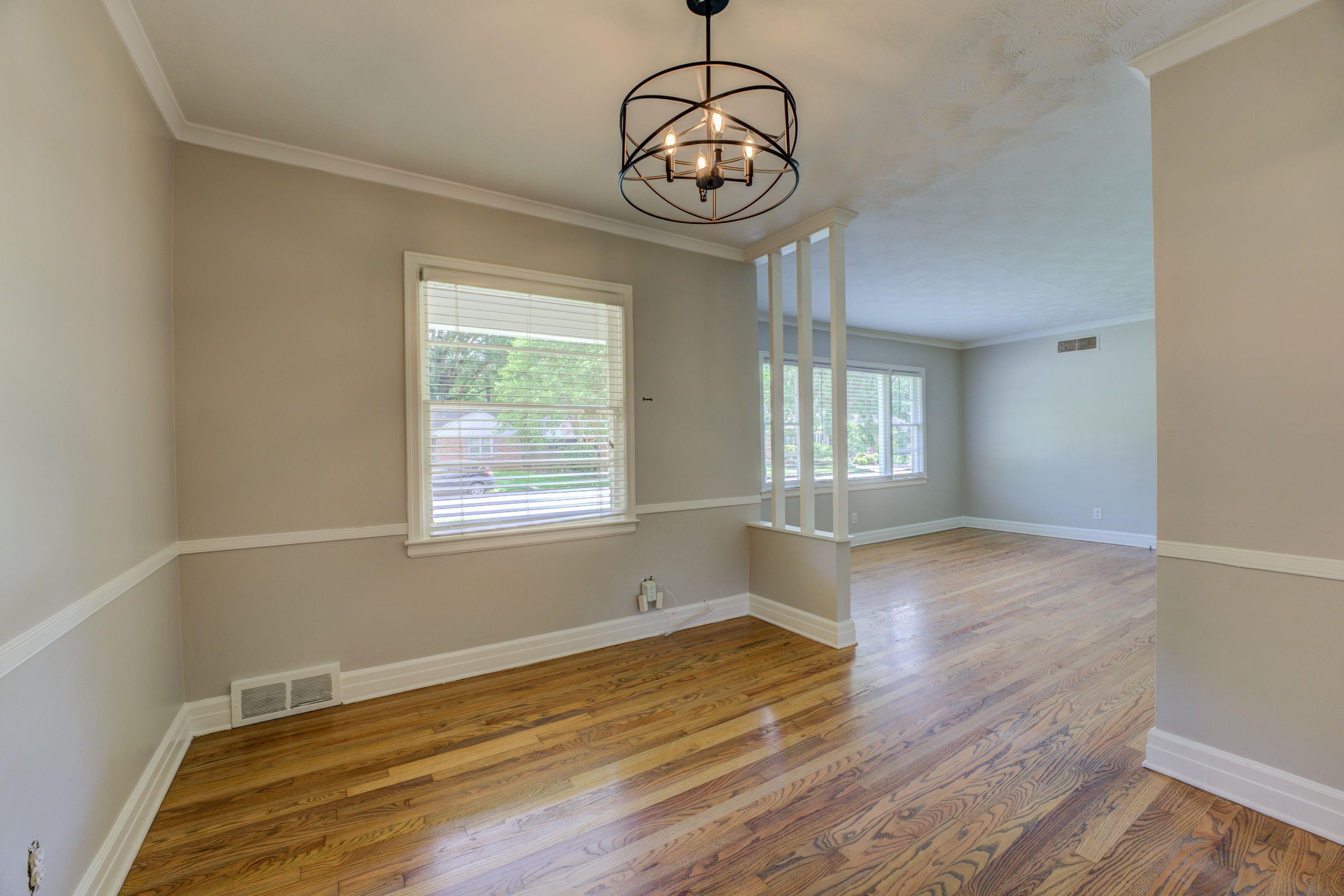 4708 Chip Road Memphis, TN 38117 - Photo 13 of 21 a view of empty room with wooden floor and fan