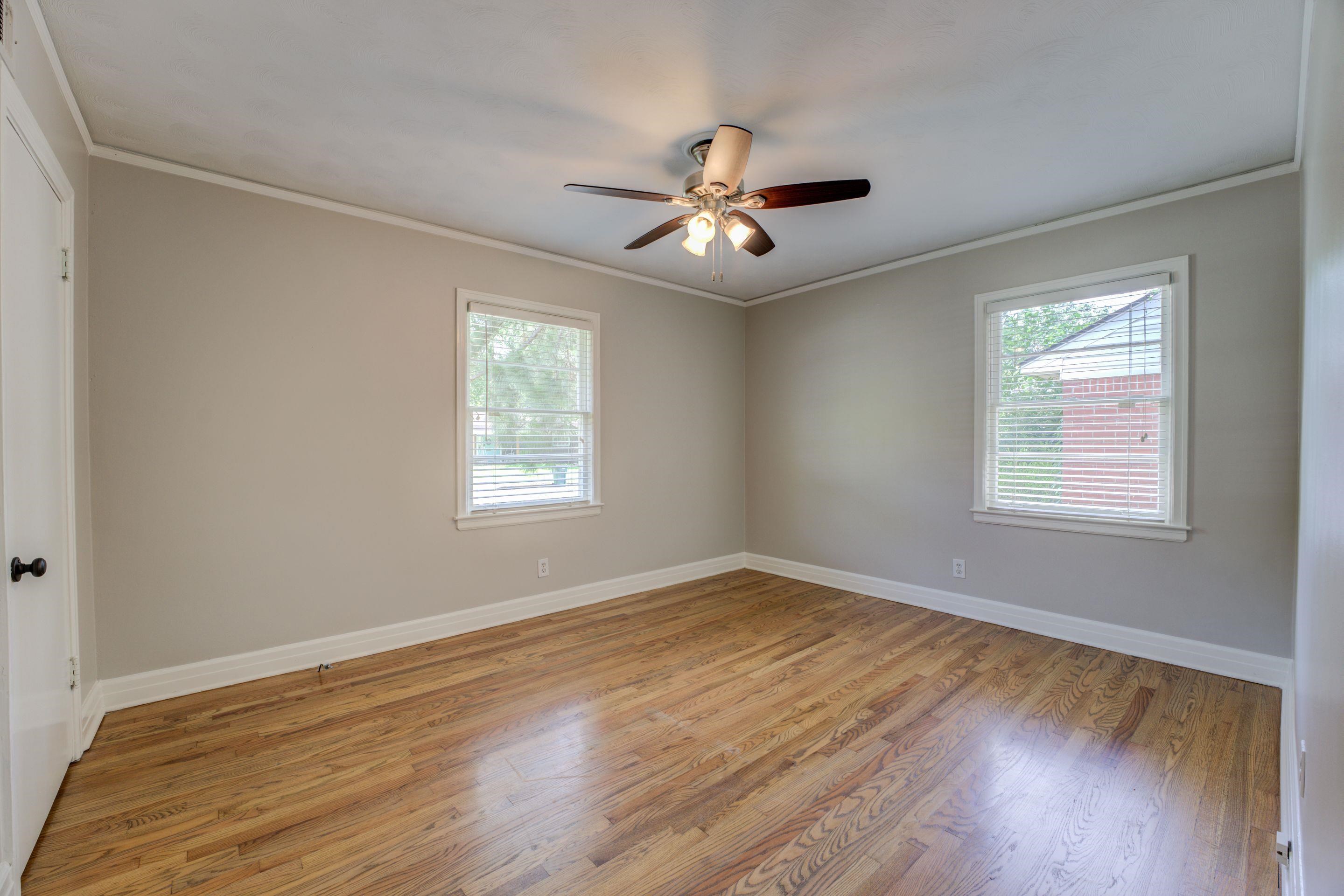 4708 Chip Road Memphis, TN 38117 - Photo 10 of 21 a view of empty room with wooden floor and fan