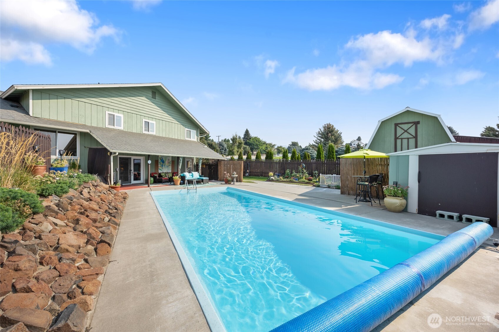 2716 8th Street Northeast East Wenatchee, WA 98802 - Photo 30 of 40 a view of house with swimming pool