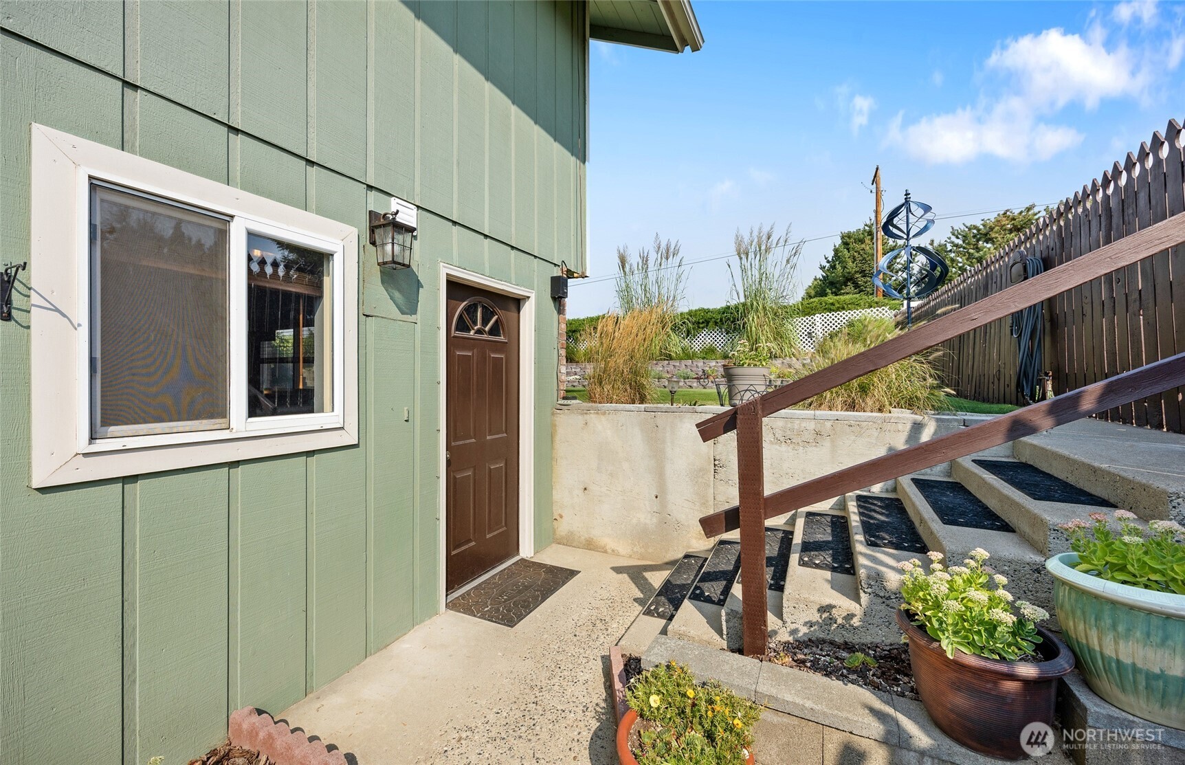 2716 8th Street Northeast East Wenatchee, WA 98802 - Photo 32 of 40 a view of stairs and a potted plant