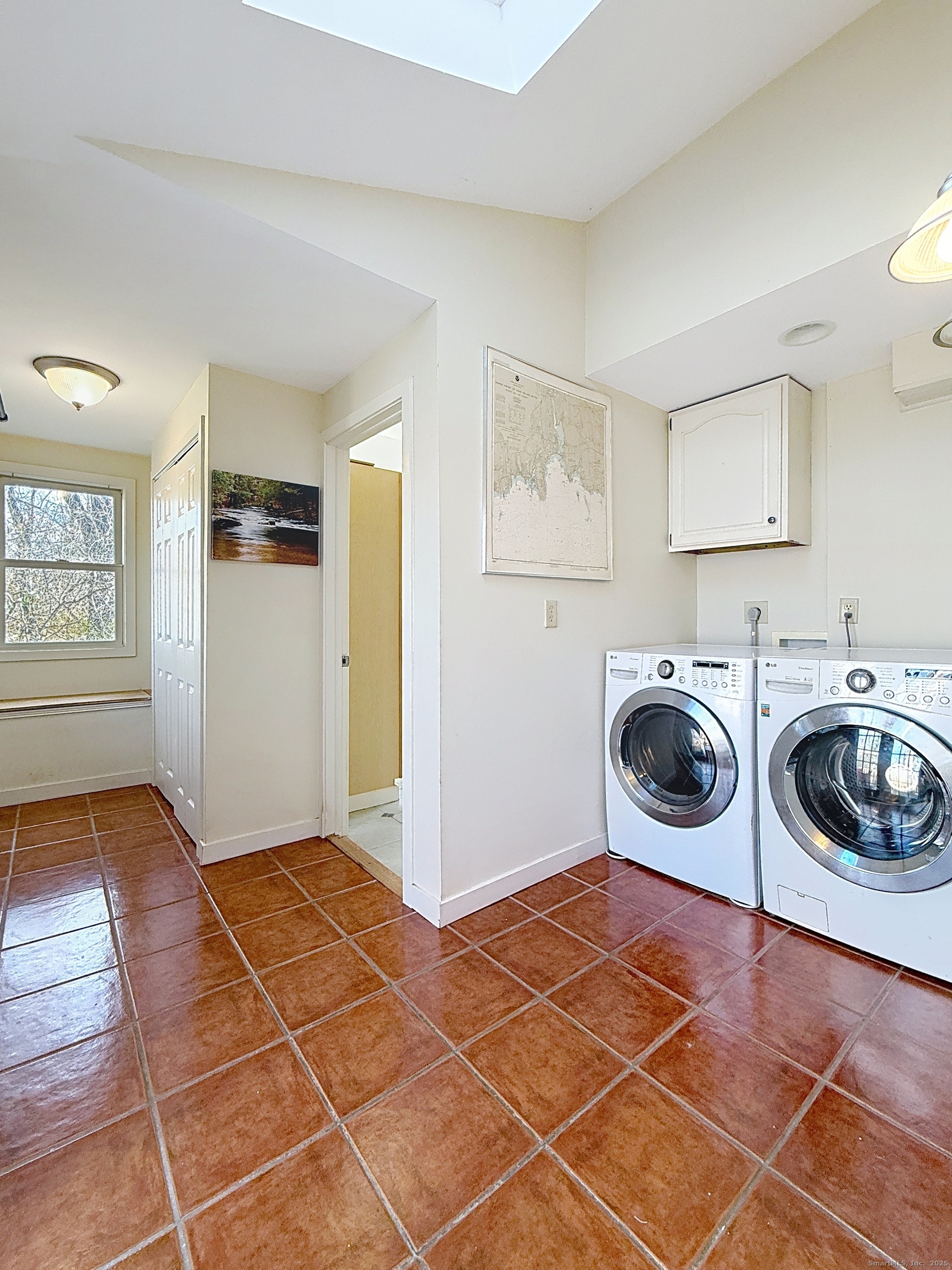 198 Forest Road Coventry, CT 06238 - Photo 11 of 24 a view of a storage & utility room with washer and dryer