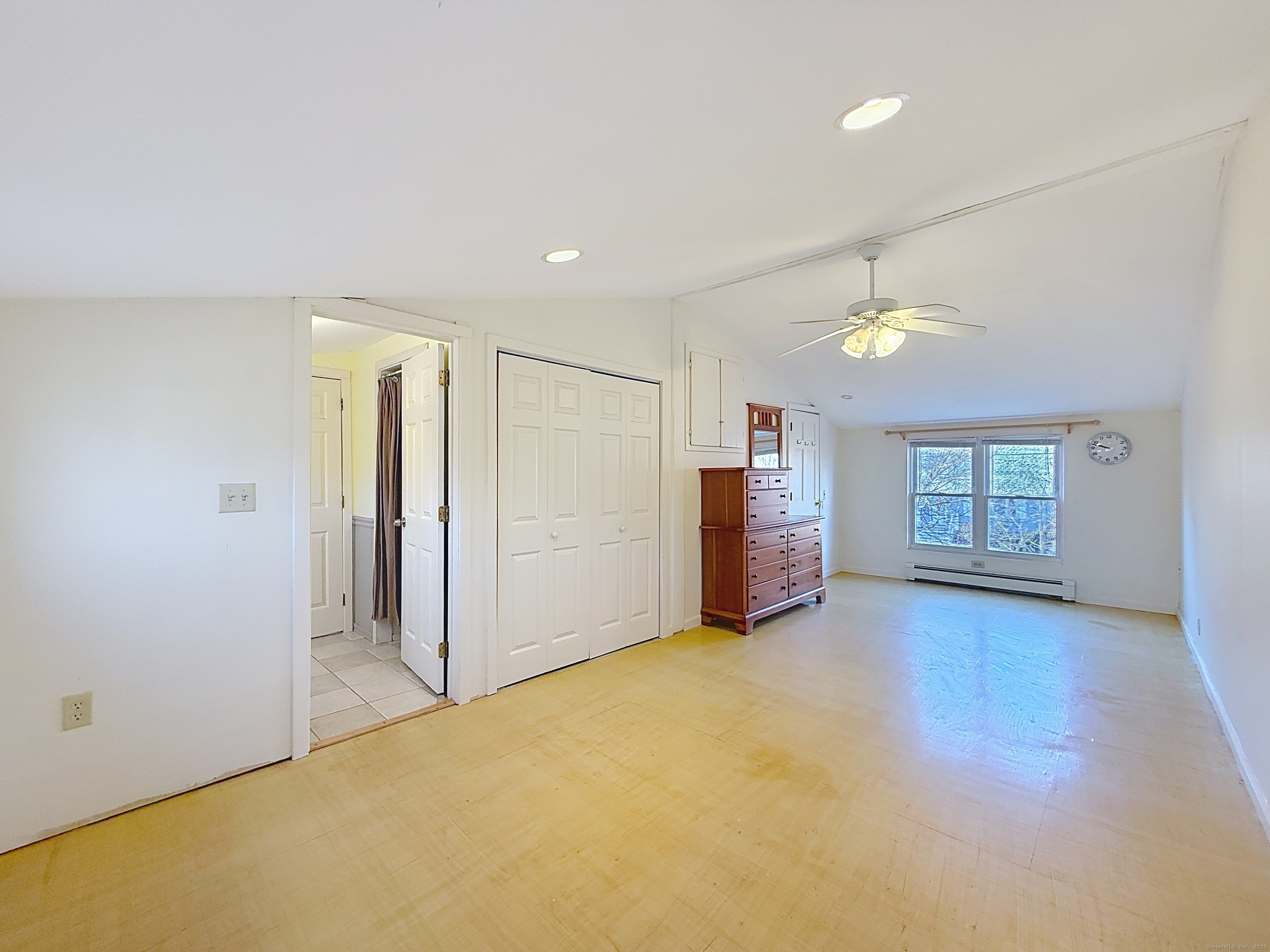 198 Forest Road Coventry, CT 06238 - Photo 15 of 24 an empty room with windows and cabinet