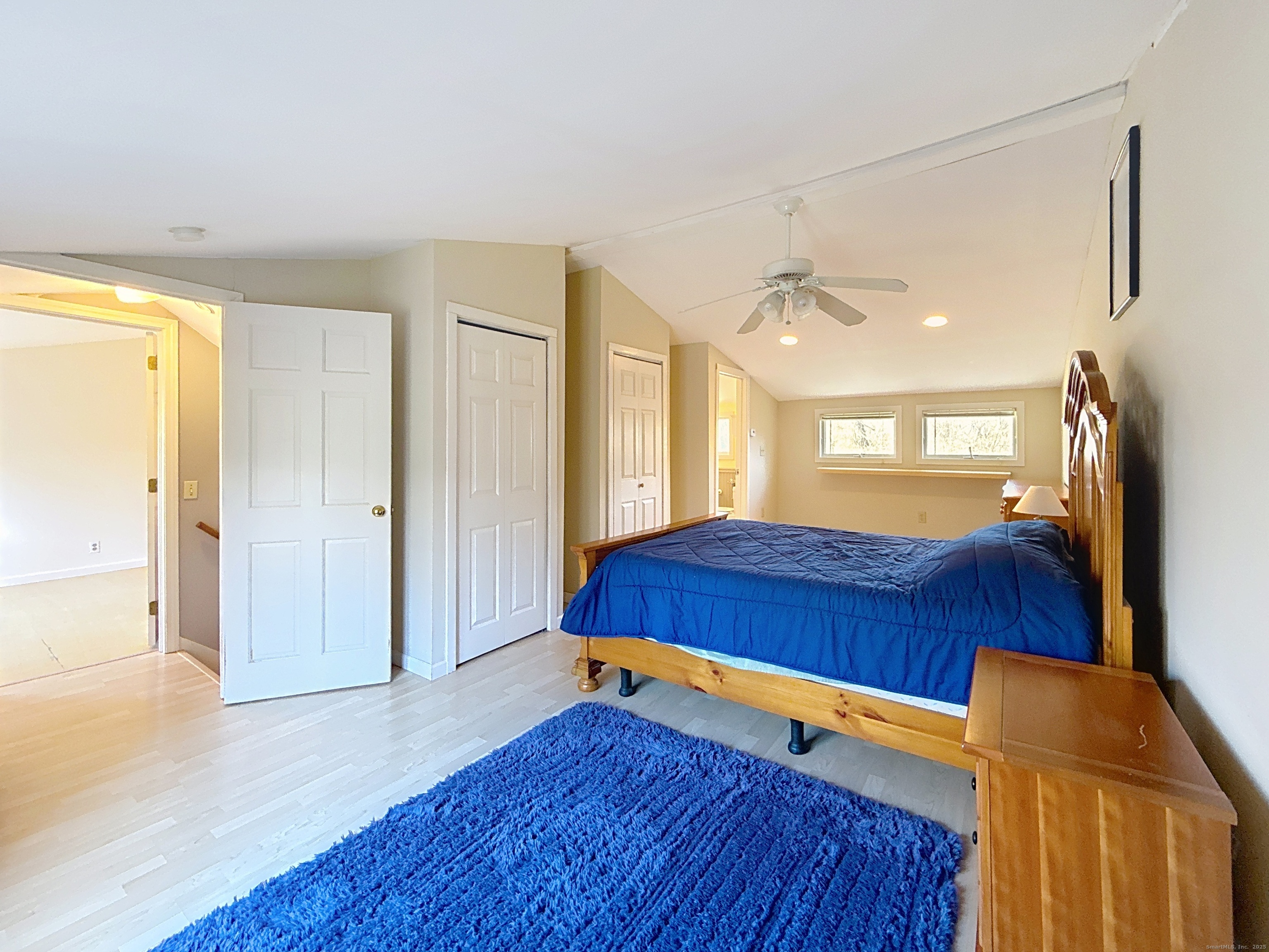 198 Forest Road Coventry, CT 06238 - Photo 19 of 24 a bedroom with a bed and wooden floor