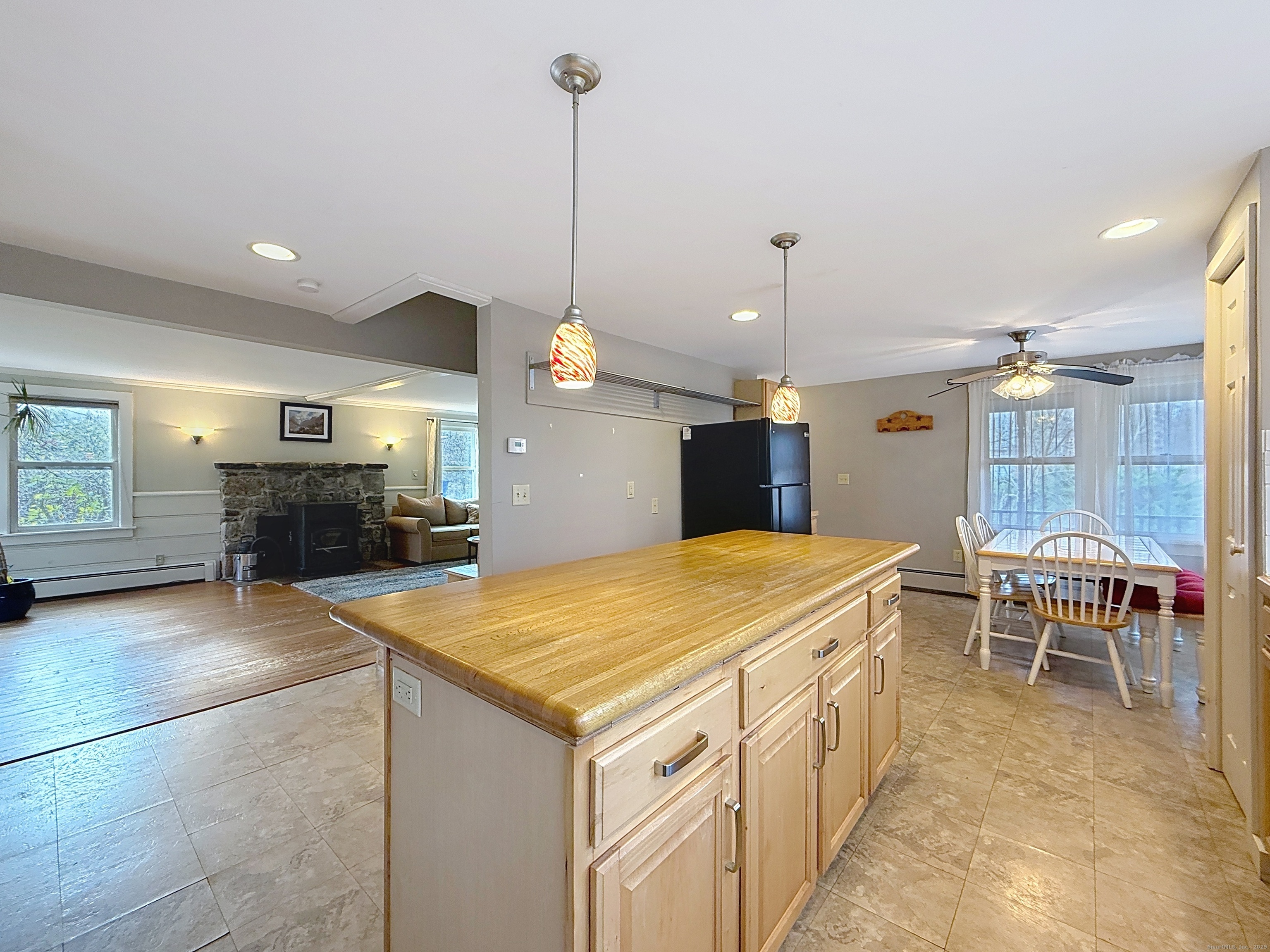 198 Forest Road Coventry, CT 06238 - Photo 5 of 24 a kitchen with a table and chairs in it