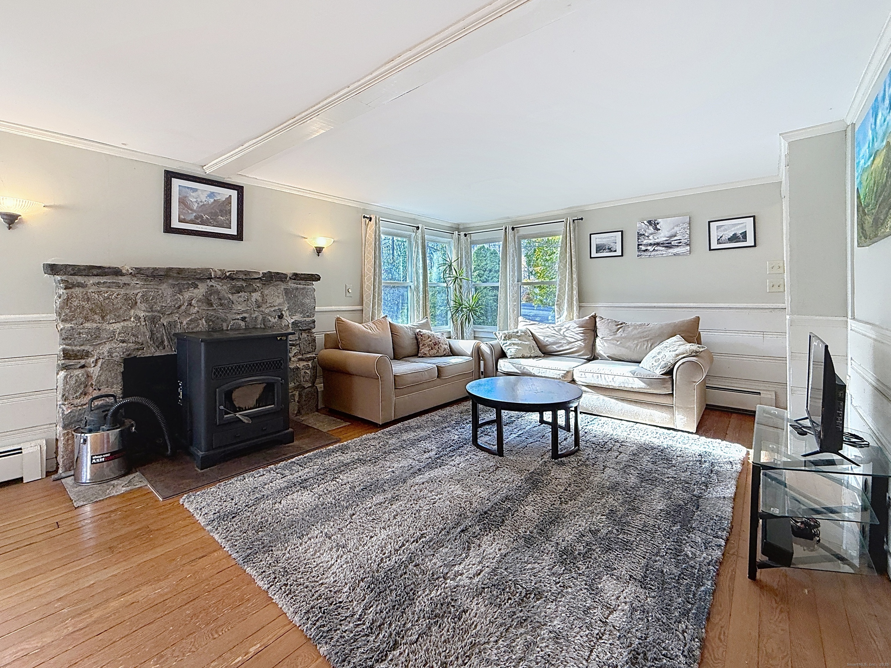 198 Forest Road Coventry, CT 06238 - Photo 6 of 24 a living room with furniture and a fireplace