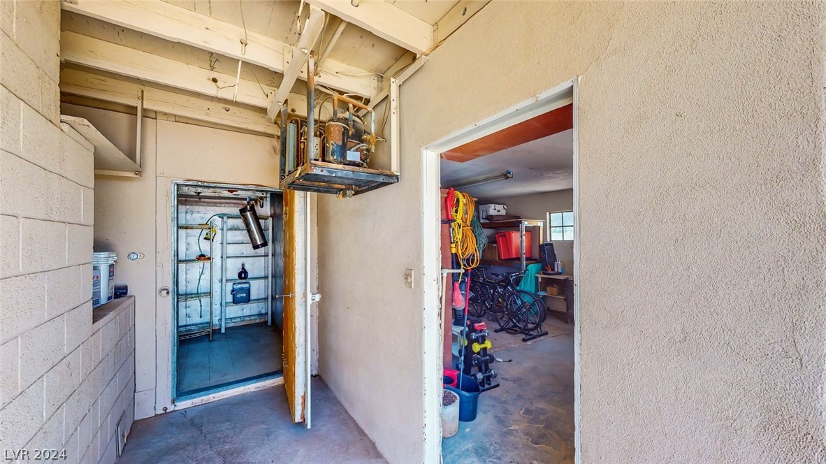 8712 Rancho Destino Road Las Vegas, NV 89123 - Photo 58 of 89 Walk in cooler and garage entry