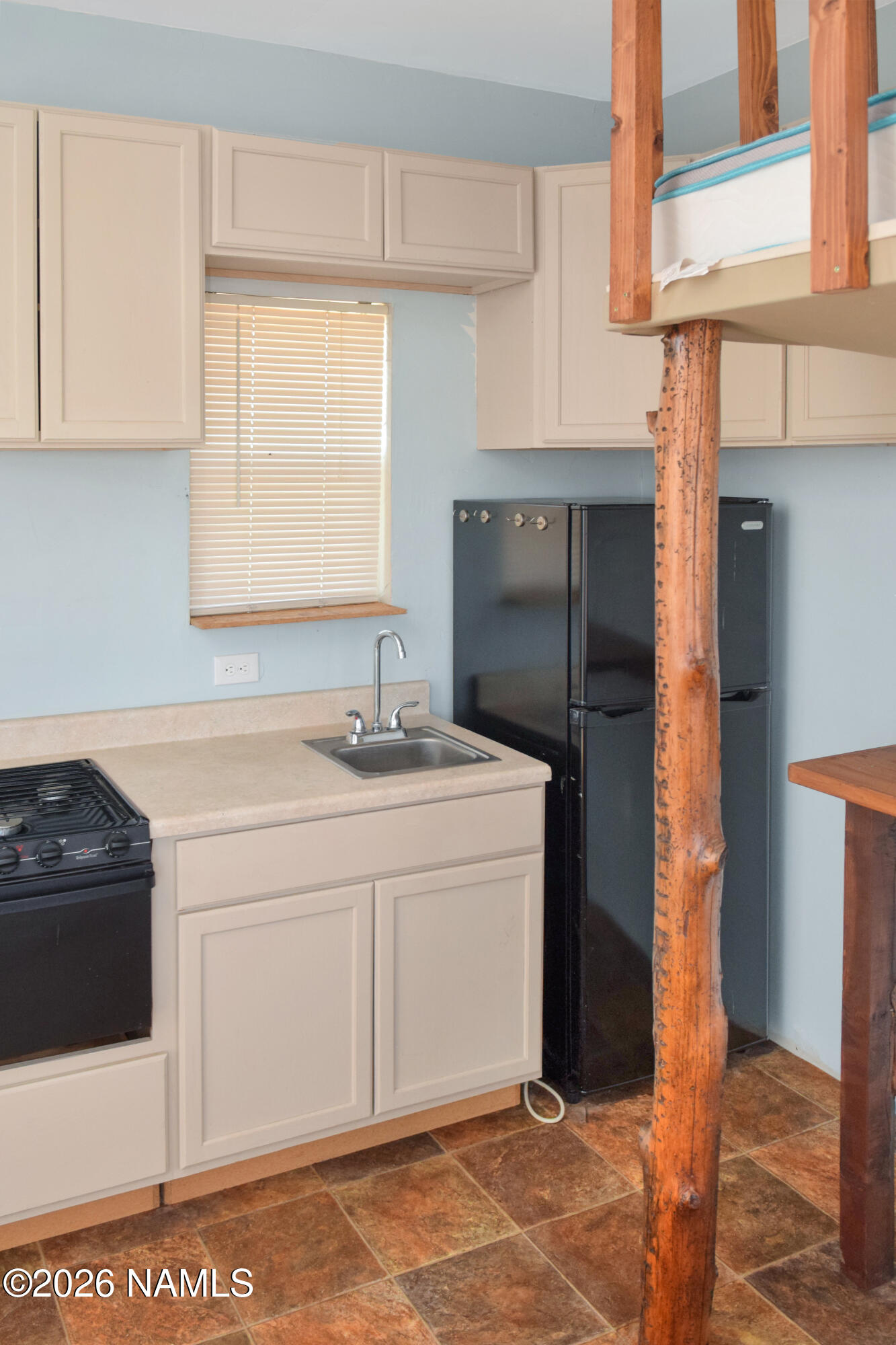 12417 East Tanner Rnch Road Flagstaff, AZ 86005 - Photo 10 of 21 a kitchen with a sink cabinets and appliances