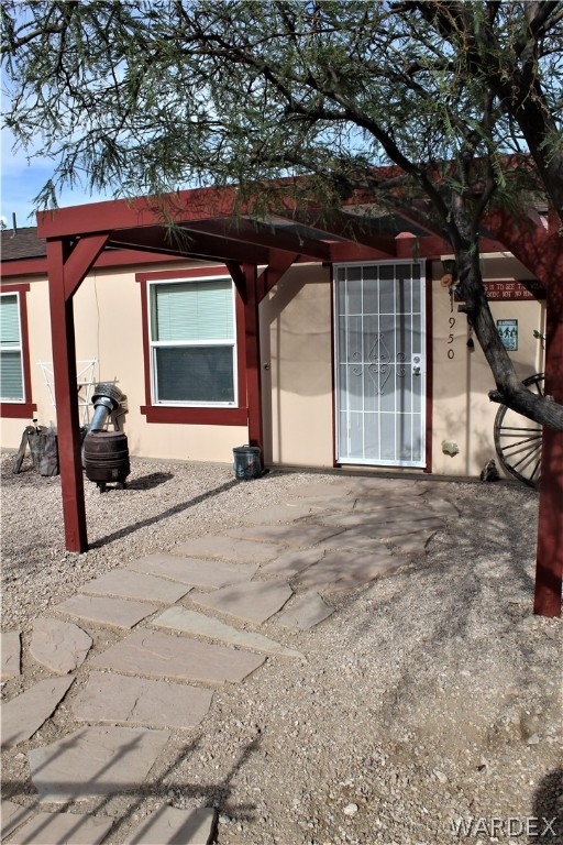 1950 Growler Road Golden Valley, AZ 86413 - Photo 13 of 42 a front view of a house with garden