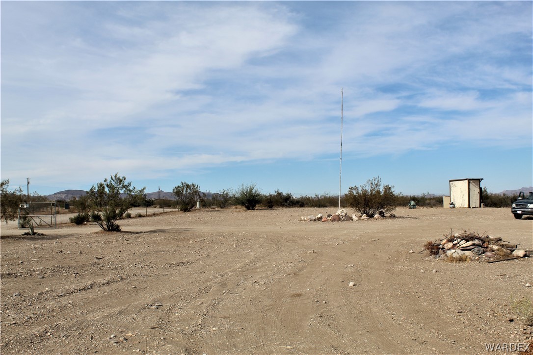 1950 Growler Road Golden Valley, AZ 86413 - Photo 16 of 42 a view of a beach with an outdoor space