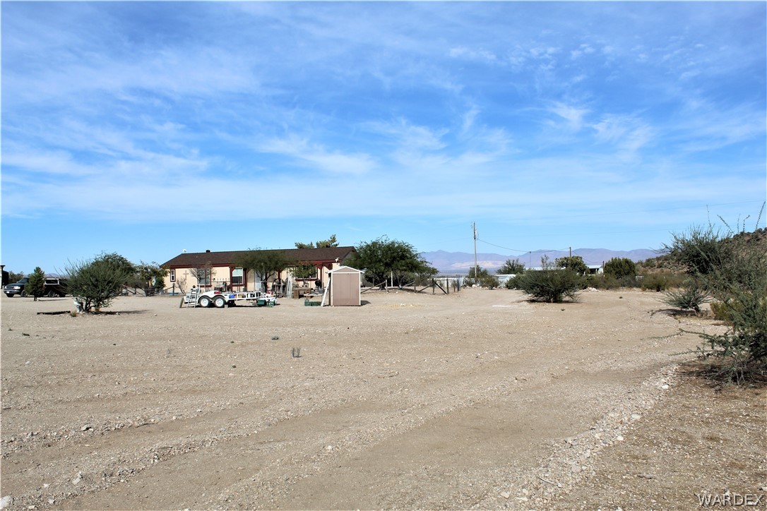 1950 Growler Road Golden Valley, AZ 86413 - Photo 3 of 42 a view of a beach and a yard