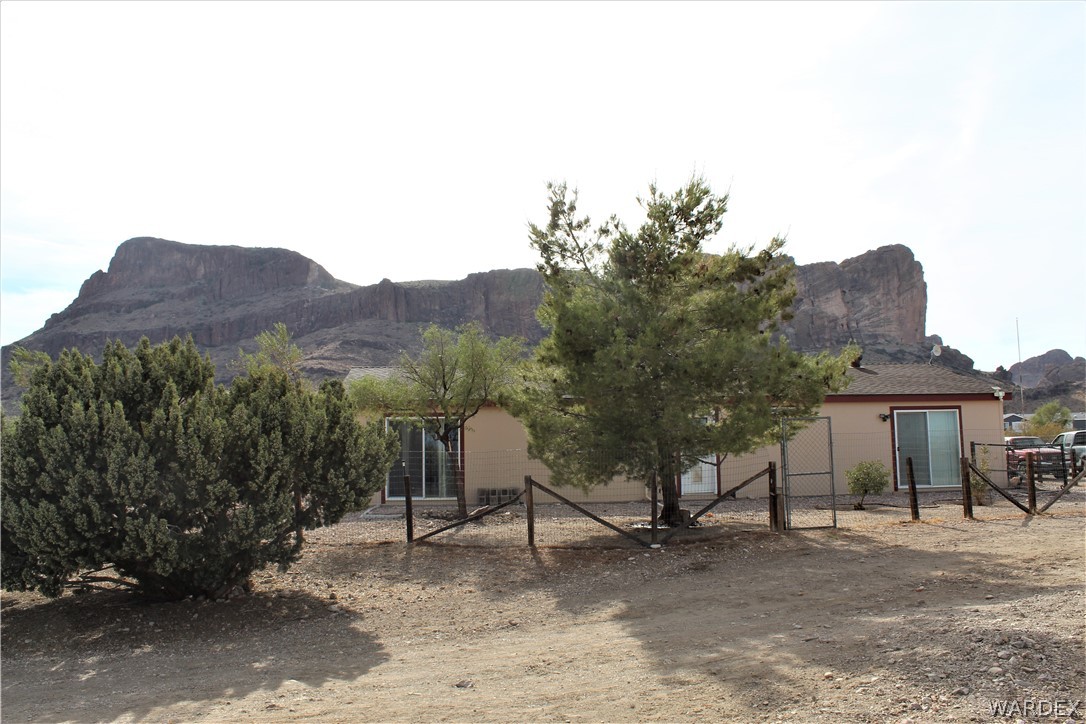 1950 Growler Road Golden Valley, AZ 86413 - Photo 8 of 42 a view of a house with a yard and sitting area