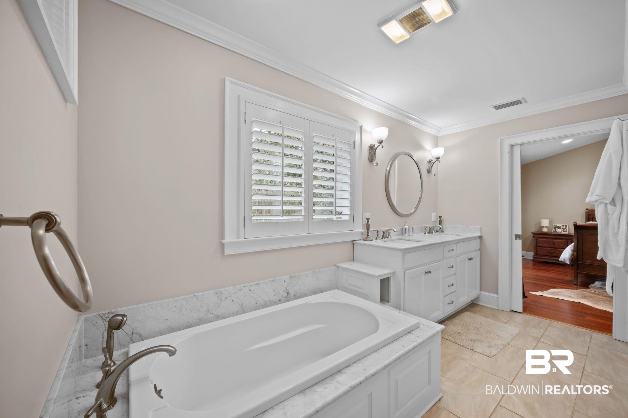 7850 Yorkhaven Road Mobile, AL 36695 - Photo 32 of 57 Full bathroom with double vanity, visible vents, a bath, and crown molding