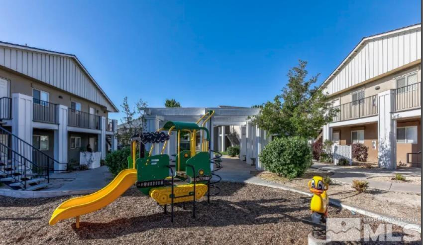 2000 Silverada Boulevard, Unit 112 Reno, NV 89512 - Photo 19 of 19 a view of a house with backyard water fountain and sitting area
