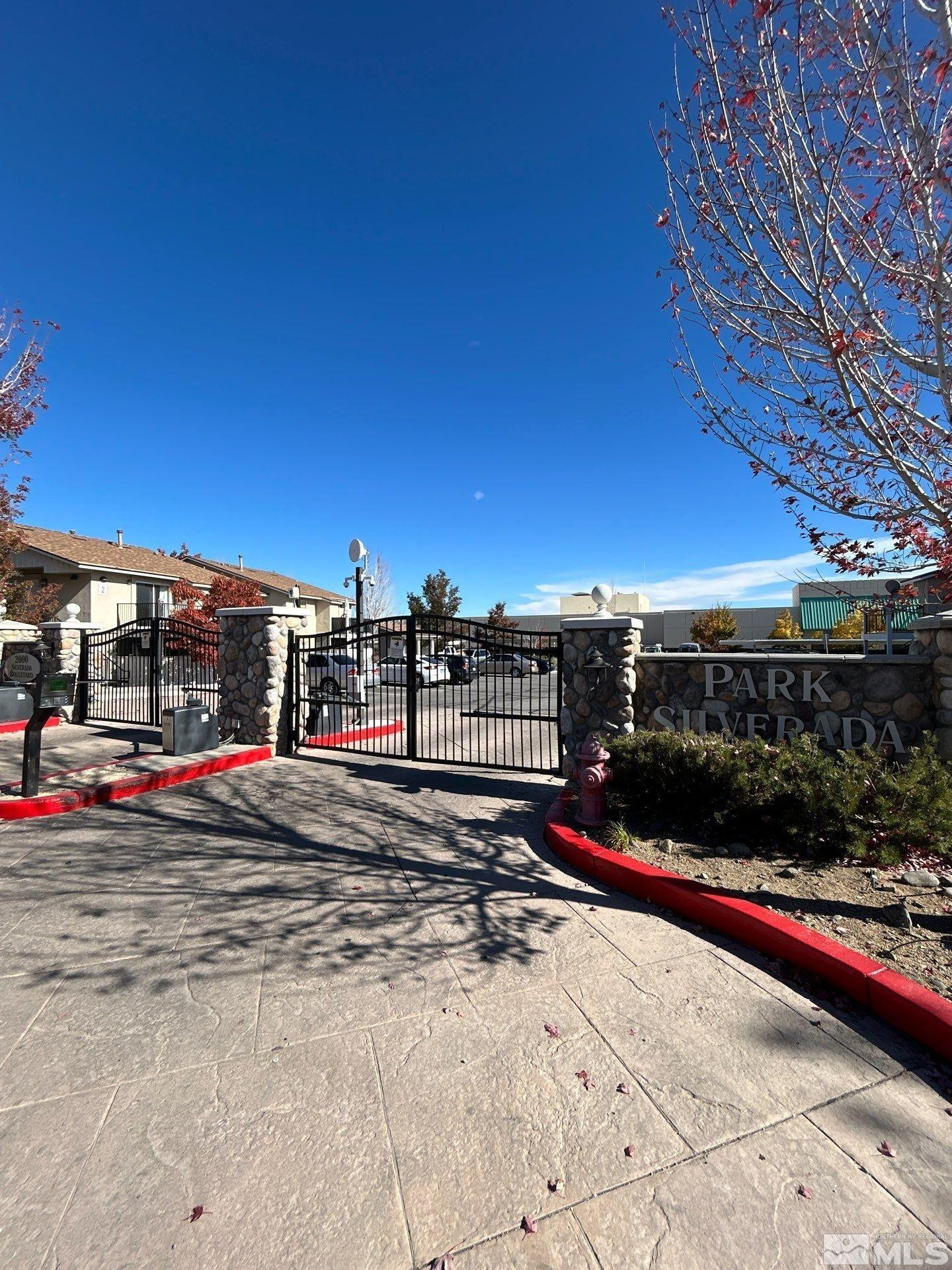 2000 Silverada Boulevard, Unit 112 Reno, NV 89512 - Photo 2 of 19 a view of street with parking