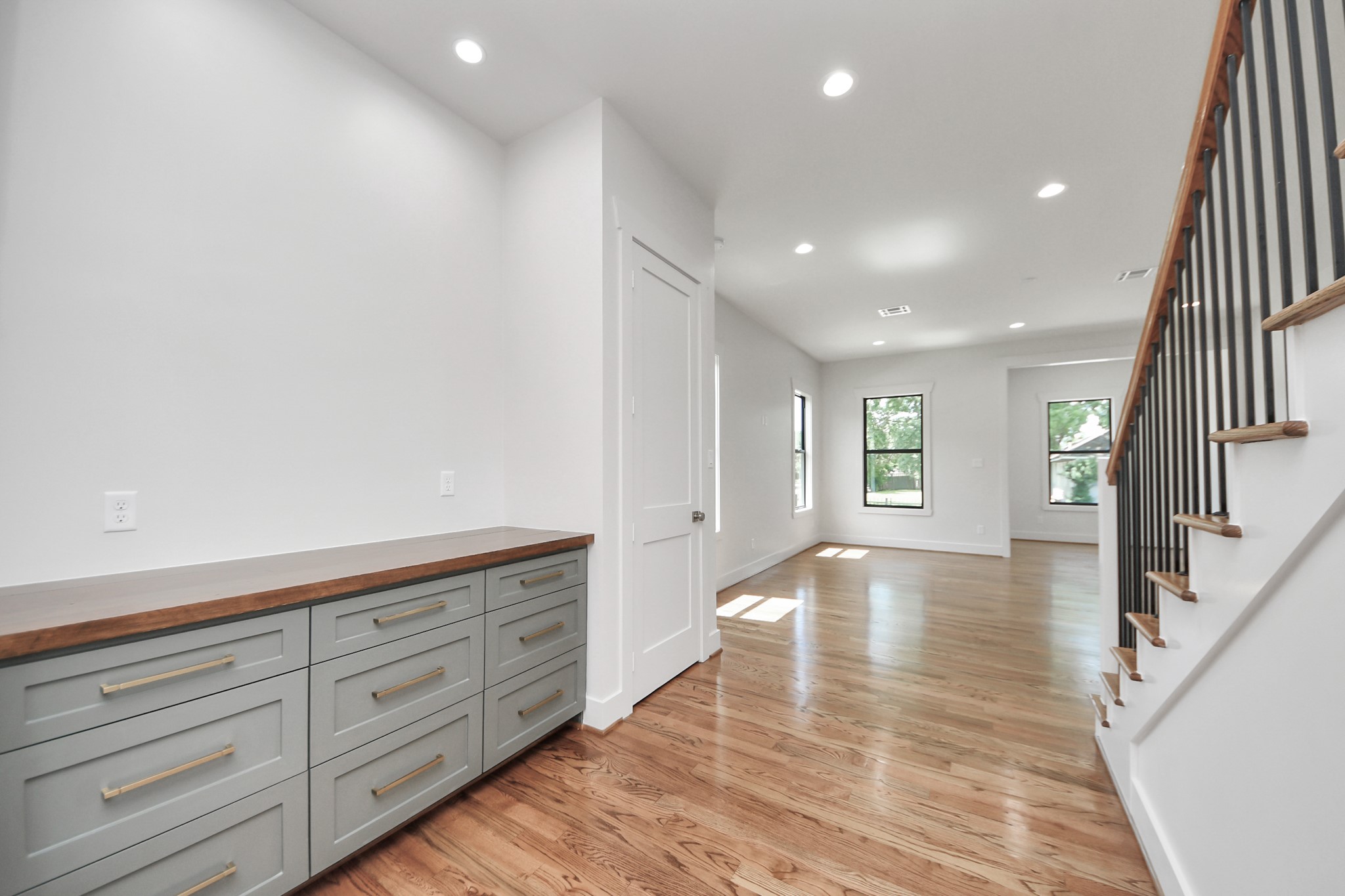 4541 Walker Street Houston, TX 77023 - Photo 12 of 24 a view of an entryway with wooden floor