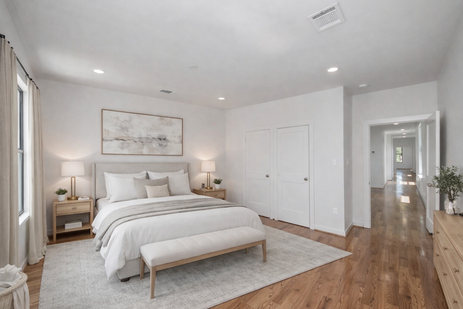 4541 Walker Street Houston, TX 77023 - Photo 15 of 24 a bedroom with a bed and a painting on the wall