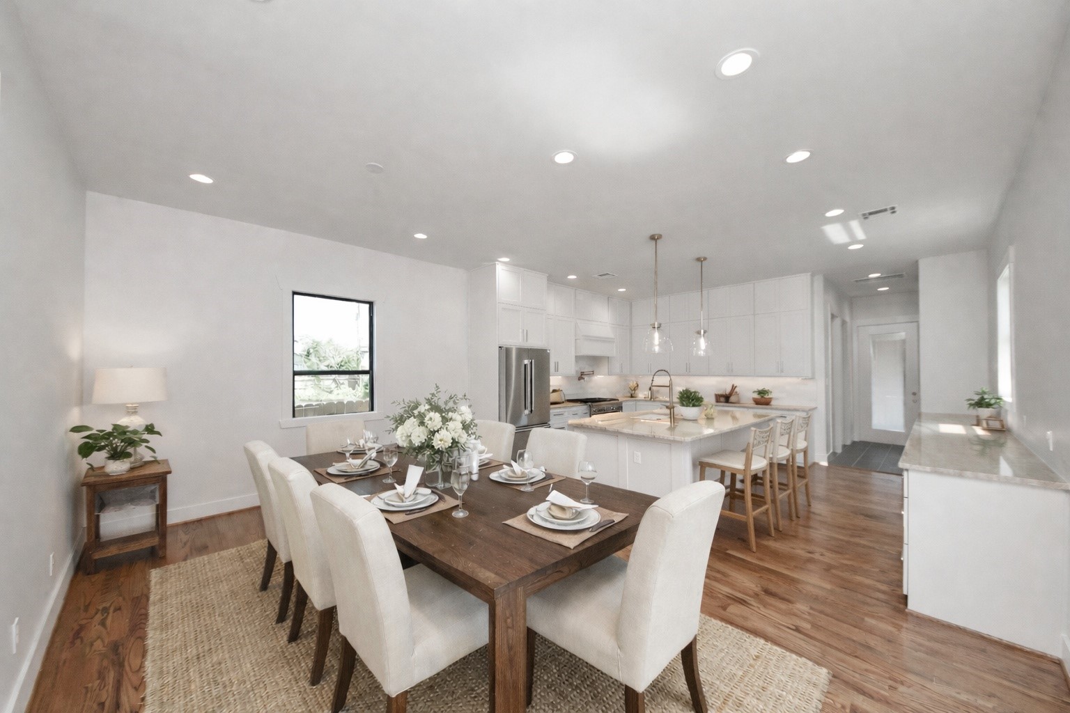 4541 Walker Street Houston, TX 77023 - Photo 2 of 24 a view of a dining area with furniture
