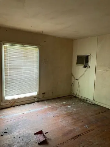 an empty room with windows